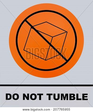 Photo of Do Not Tumble sign. This photo was taken from sign board.