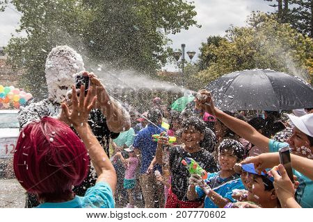 Foam Is Sprayed On Everyone In Annual Party In Cuenca, Ecuador