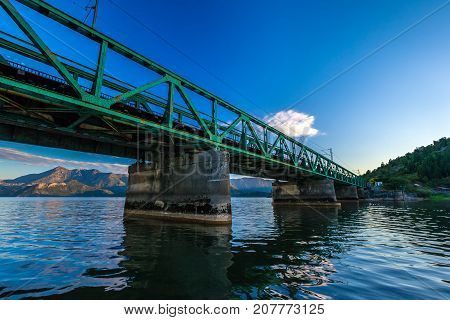 The mountains are under the bridge on the Skadar Lake. Montenegro. Photo taken at Skadar Lake Podgorica region.