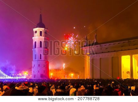 Vilnius, Lithuania - January 01, 2017: The main firework in Lithuania at New Year at Vilnius, Lithuania on January 01, 2017. The most interesting and popular viewpoint to historical disrict of Vilnius with Gediminius tower.