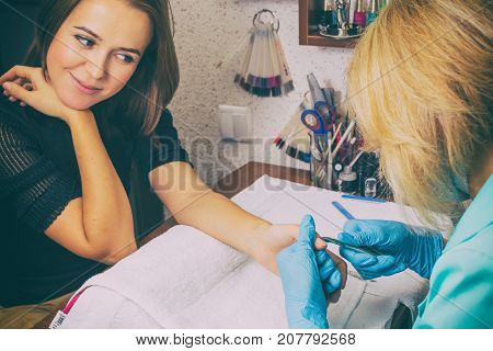 For A Girl Doing A Manicure On The Photo.