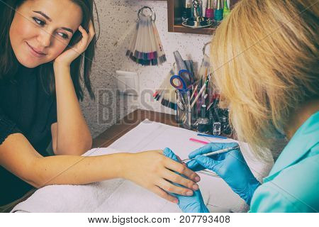 For A Girl Doing A Manicure On The Photo.