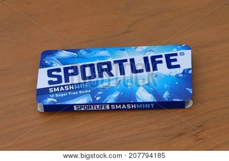 Almere, The Netherlands - October 8, 2017: Sportlife Extramint Suger Free Chewing Gum package against a wooden background.
