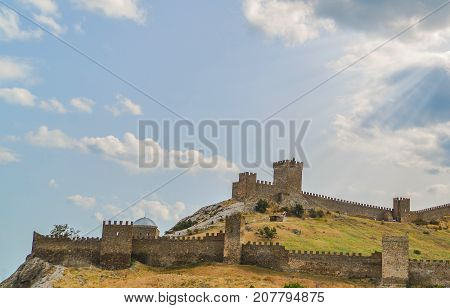 Genoese fortress in Sudak, the Crimea Peninsula, Black sea. Consular castle and the fortification wall of the upper tier. Part of the wall, Museum-reserve 