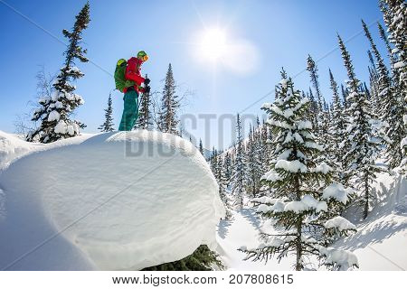 Man Standing At Top Of Ridge. Ski Touring In Mountains. Adventure Winter Freeride Extreme Sport