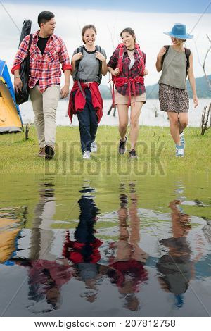 Asian friends group walk togather in outdoor and camping activity