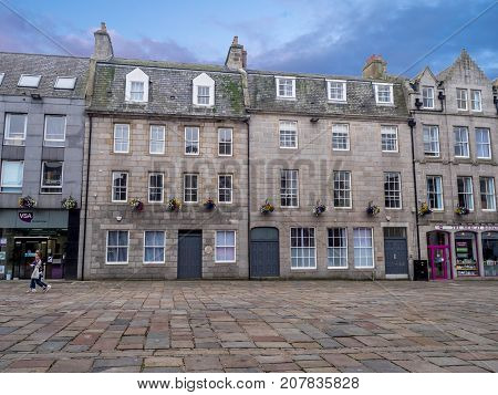 ABERDEEN, SCOTLAND: JULY 25: Buildings on Union Square on July 25, 2017 in Aberdeen, Scotland.  Union Square is the old central square in the city of Aberdeen.