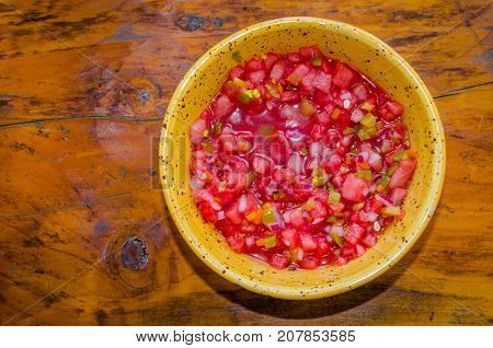 Fresh and tasty watermelon salsa. Healthy fruit, vegetable, herb and spices used to create this tasty appetizer. Perfect dish for party, picnic or satisfying snack.