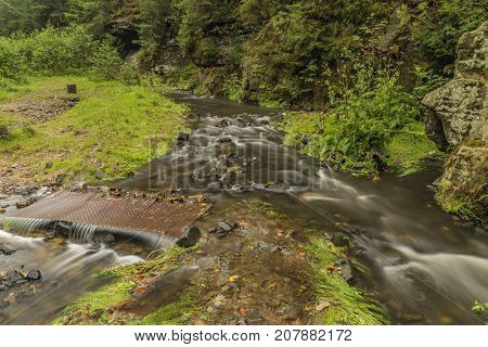 Chribska Kamenice river in national park Ceske Svycarsko in autumn morning