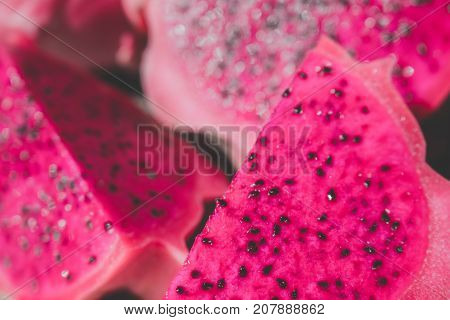 Slices Of Red Dragon Fruit, Soft Focus Or Blur Background