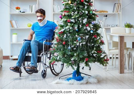 Injured disabled man celebrating christmas at home