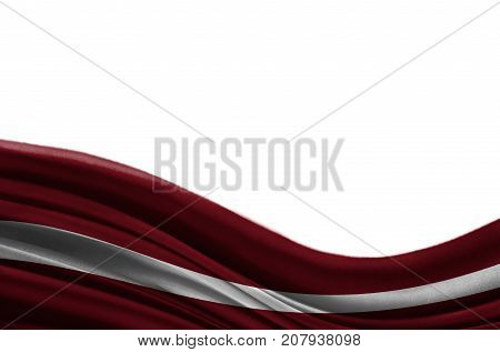 Grunge colorful flag Latvia with copyspace for your text or images,isolated on white background. Close up, fluttering downwind.