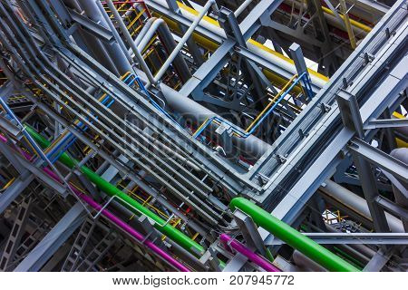 The different colored pipes in the installation of a petrochemical plant