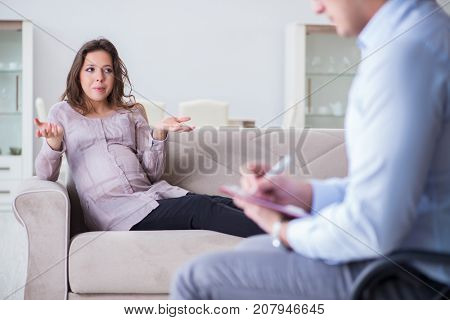 Pregnant woman visiting psychologist doctor