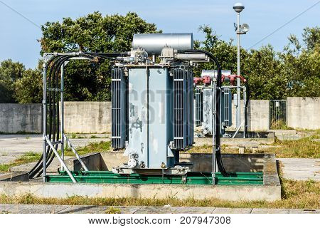 Old high voltage electric transformer power station. Industrial electricity facility on Silba - Croatia.