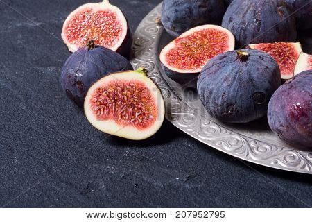 Ripe sweet figs . Healthy mediterranean fig fruit .
