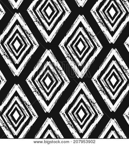 Hand drawn vector abstract rought hand made rhombus seamless pattern in black and white colors.Tribal ethnic ornament decoration.Freehand textures.Unusual universal pattern.