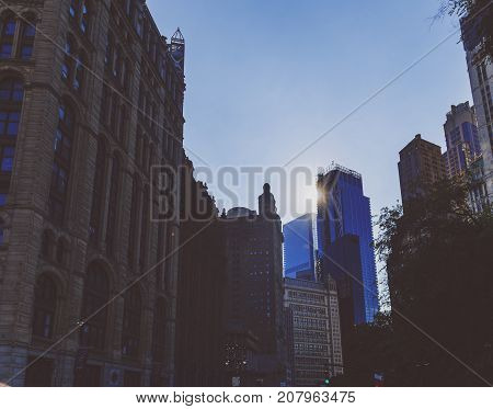 NEW YORK NEW YORK - September 4th 2017: Architecture and beautiful buildings along the streets of Manhattan New York in the City Hall area near Brooklyn Bridge on a sunny late summer day