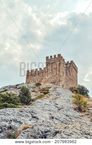Genoese fortress in Sudak, the Crimea Peninsula, Black sea. Consular castle and the fortification wall of the upper tier. Part of the wall, Museum-reserve 