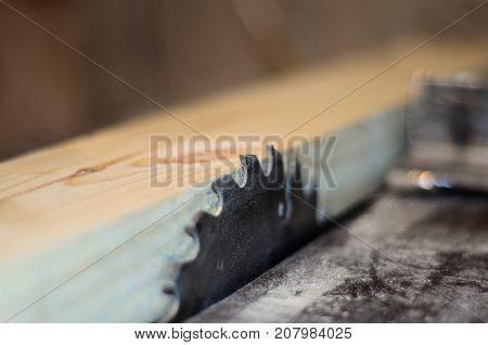 Board On A Table Of Circular Saw. Selective Focus