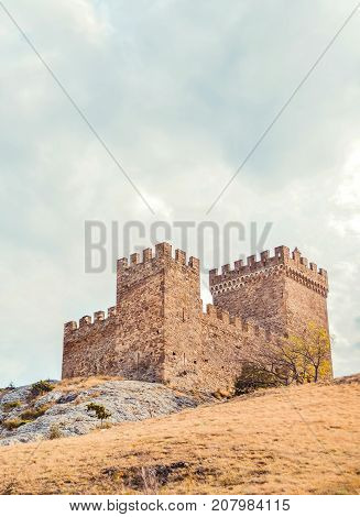 Genoese fortress in Sudak, the Crimea Peninsula, Black sea. Consular castle and the fortification wall of the upper tier. Part of the wall, Museum-reserve 