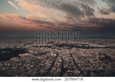 Athens skyline sunrise viewed from Mt Lykavitos with Acropolis, Greece.