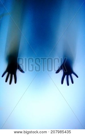 Ghosts On Transparent Background. Paranormal,conceptual Photo Hand On The Glass, Silhouette Through