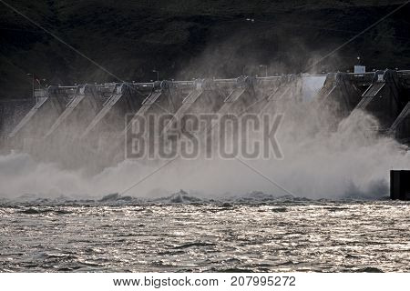 Water rushes over Wanapum Dam on the Columbia River to generate hydroelectric power for the Pacific Northwest.