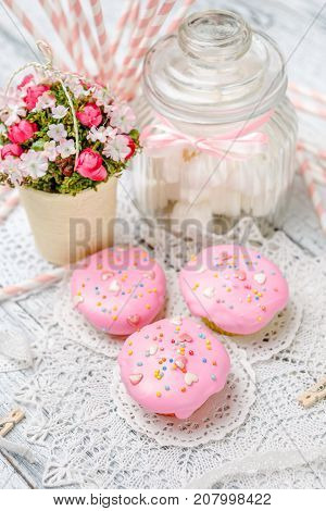 Traditional Easter cupcake with decorations and cupcakes on wooden table