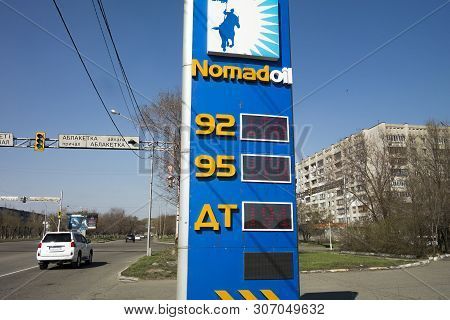 Kazakhstan, Ust-kamenogorsk, April 23, 2019: Scoreboard For Fuel Prices. Nomadoil Gas Station