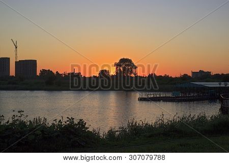 Sunset Or Sunrise In The City. Modern Residential District Near The Pond Of Saint Petersburg, Russia