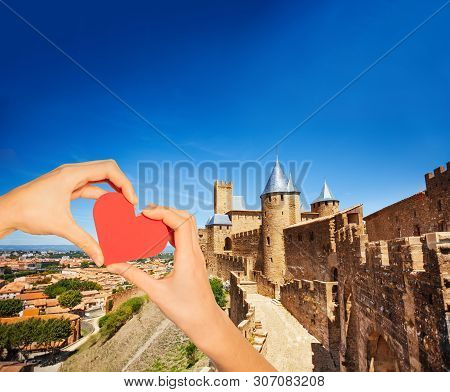 Hand Hold Red Heart Over Carcassonne City Walls