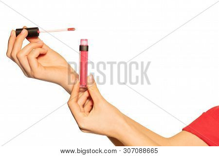 Womans Hands With Liquid Lipstick And Applicator
