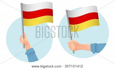 South Ossetia Flag In Hand. Patriotic Background. National Flag Of South Ossetia Vector Illustration