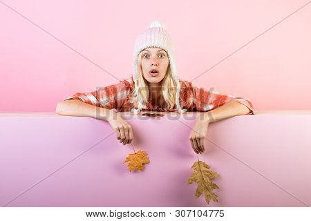 Girl In Autumn Playing With Leaves On Autumn Leaves Background. Beautiful Sexy Young Woman Holding G