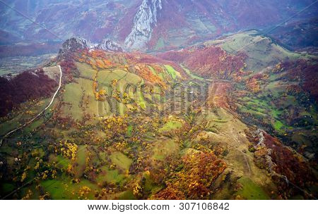 aerial view of Carpathian mountains countryside in autumn morning, Romania