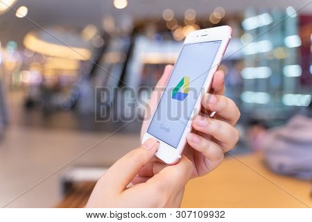 Chiang Mai, Thailand - May.10,2019: Woman Holding Apple Iphone 6s Rose Gold With Google Drive Apps O