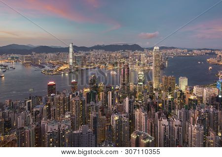 Victoria Harbor Of Hong Kong City At Dusk