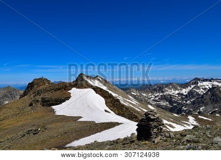 Lonely Trekker On The Top Of The World