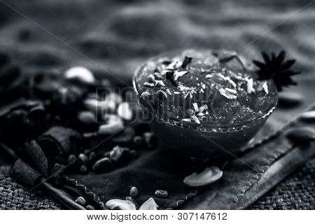 Famous Mango Preservation I.e. Murba Or Murabba In A Glass Bowl On Jute Bags Surface Along With Dry