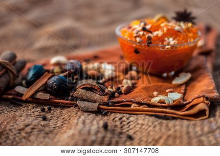 Famous Mango Preservation I.e. Murba Or Murabba In A Glass Bowl On Jute Bags Surface Along With Dry