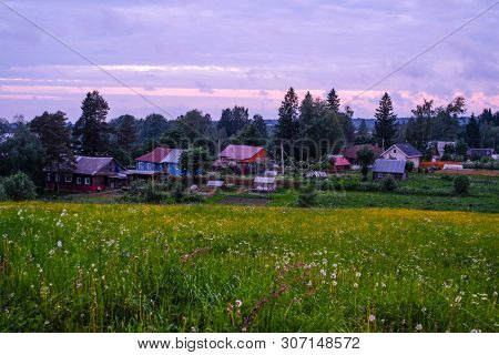 landscape with the image of russian north village Ferapontovo in Vologda region