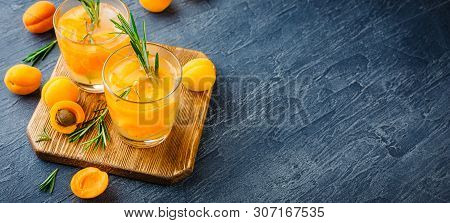 Summer Drinks, Rosemary Aprcot Cocktails With Ice In Glasses. Refreshing Summer Homemade Alcoholic O