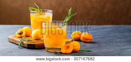 Summer Drinks, Rosemary Aprcot Cocktails With Ice In Glasses. Refreshing Summer Homemade Alcoholic O