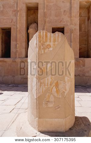 Mortuary Temple Of Hatshepsut In Deir El-bahari. Ancient Wall With The Engraved Egyptian Hieroglyphs