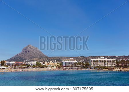 Xabia Spain Playa Del Arenal In Summer With Blue Sky And Sea, Also Known As Javea