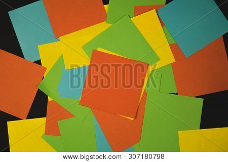 Different Color Paper Stickers With Pins Isolated On Black Background.