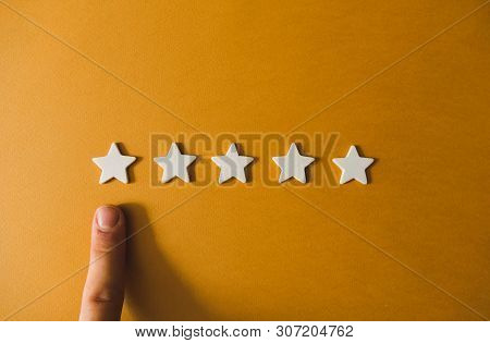 Five White Stars On An Orange Background
