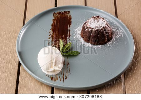 Delicious Fresh Fondant With Hot Chocolate And Ice Cream Served On Plate. Lava Cake Recipe