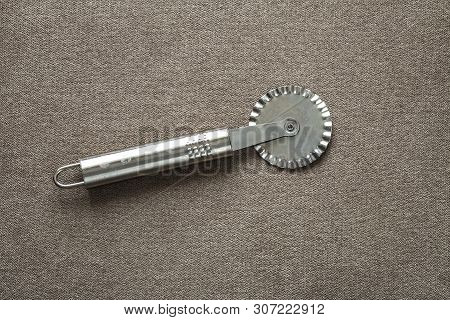 Close-up Of Sharp Stainless Steel Metal Kitchen Tool Made Of Stainless Steel Metal For Cutting Dough